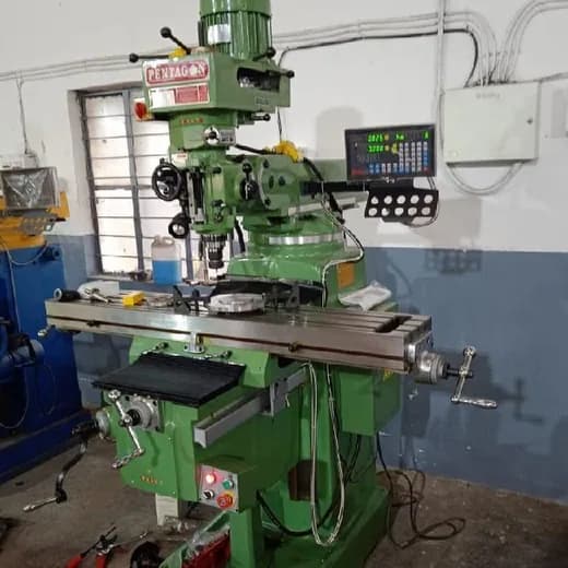 Vertical turret milling machine with digital readout in the machine shop